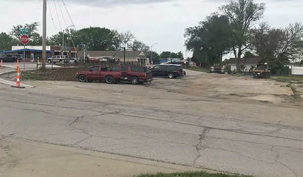 photo of lot with some cars.